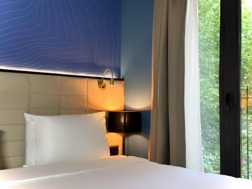 Postel nebo postele na pokoji v ubytování Design Hotel & Private Spa - Tbilisi Edition