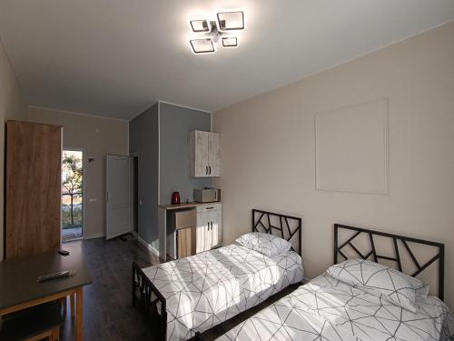 Llit o llits en una habitació de Сурок