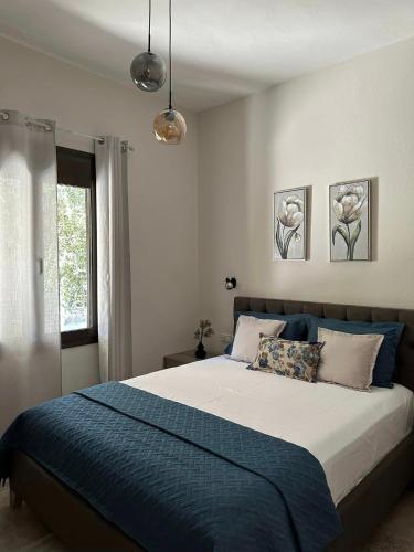 Ένα ή περισσότερα κρεβάτια σε δωμάτιο στο Valia House Thassos