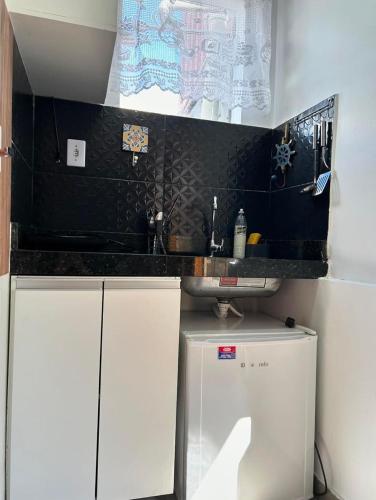 Η κουζίνα ή μικρή κουζίνα στο Flat Container Pontal do Atalaia