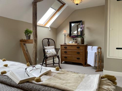 Voodi või voodid majutusasutuse Daisys Place at Middle Farm and Cottages toas