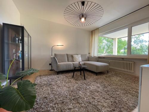 Katil atau katil-katil dalam bilik di Großzügiges Wohnen mit Seeblick in Zentrumsnähe