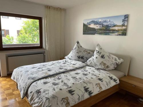 Postel nebo postele na pokoji v ubytování Ferienhaus Partenkirchen