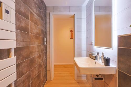 Bilik mandi di Appartements Les Vosges