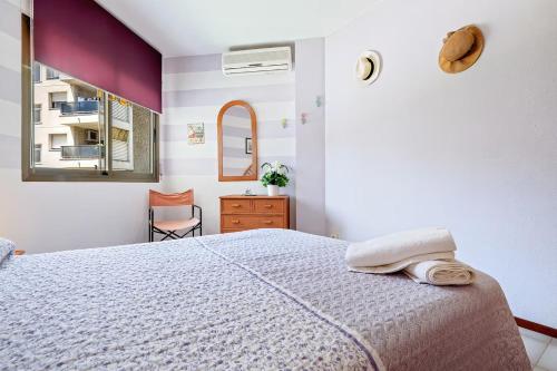 Ένα ή περισσότερα κρεβάτια σε δωμάτιο στο Bumbai