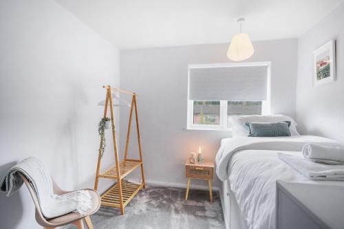 Katil atau katil-katil dalam bilik di Kingside Residence Stevenage