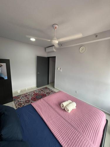 Ένα ή περισσότερα κρεβάτια σε δωμάτιο στο Qsara Home Gamuda Garden