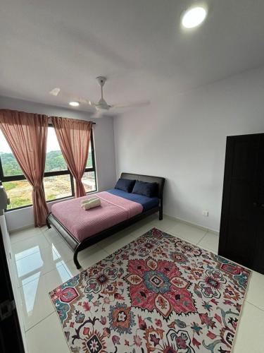 Ένα ή περισσότερα κρεβάτια σε δωμάτιο στο Qsara Home Gamuda Garden