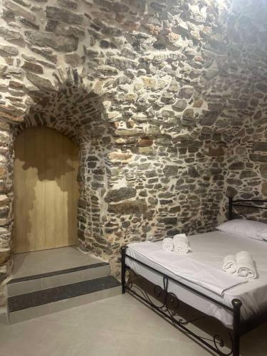 Vlychos Olympi Lodges - Chios Cozy Getawaysにあるベッド