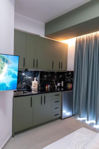 Kuchyň nebo kuchyňský kout v ubytování Euphoria Apartments