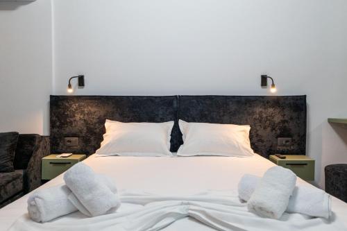 Postel nebo postele na pokoji v ubytování Euphoria Apartments