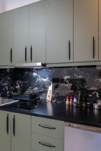 Kuchyň nebo kuchyňský kout v ubytování Euphoria Apartments