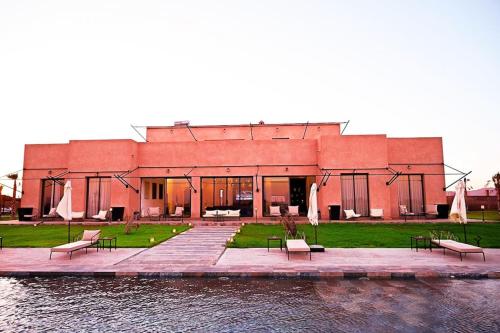 Πισίνα στο ή κοντά στο Somptueuse Villa avec Paddle, Hammam et Wi-Fi