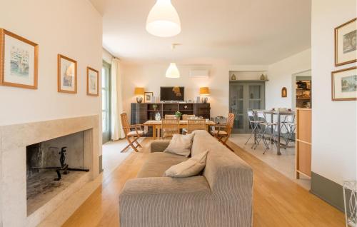 a living room with a couch and a fireplace at Nice Home In Torri In Sabina With Wifi in Torri in Sabina