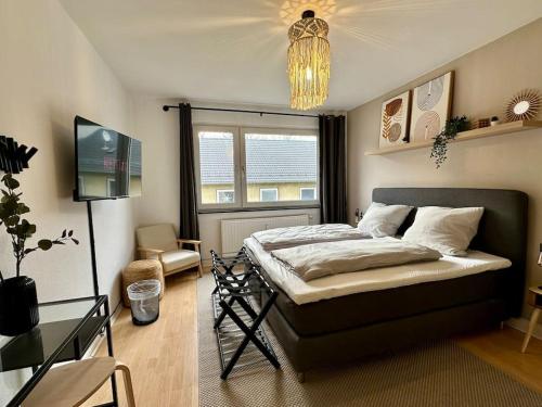 Postel nebo postele na pokoji v ubytování Boho Bliss 2R Apartment Zentral