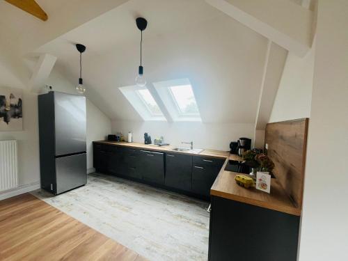 Кухня или мини-кухня в Gutshof von Gemünden Ferienwohnung 1
