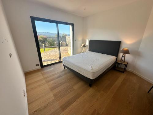 Postel nebo postele na pokoji v ubytování Résidence LMG