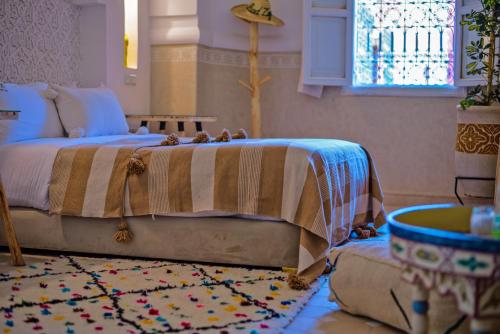 Letto o letti in una camera di Riad Zayn & Spa