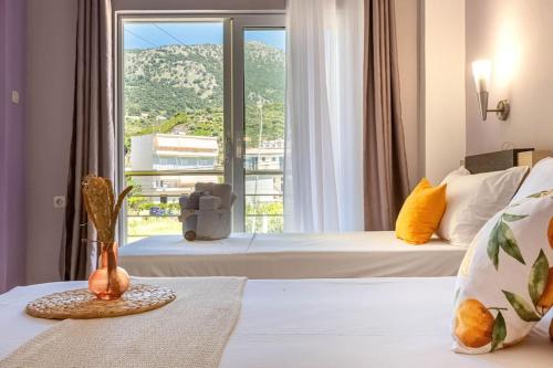 Postel nebo postele na pokoji v ubytování Potam'Sea Bliss 5 - Beach Front, Sun Beds & Parking