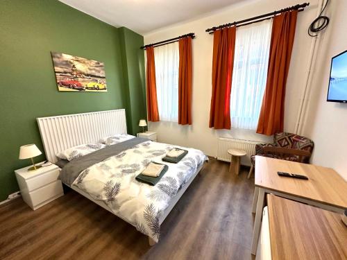 Postel nebo postele na pokoji v ubytování Yellowhouse Room 2
