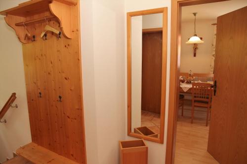 an open door to a room with a dining room at Bocksleitnerhof in Wackersberg