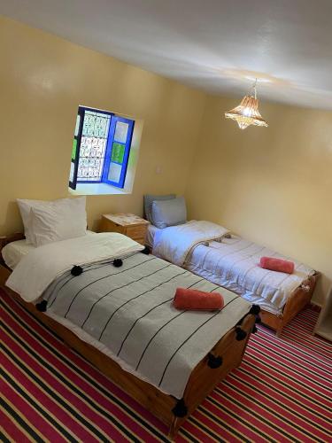 Cama o camas de una habitación en Gîte Imarin