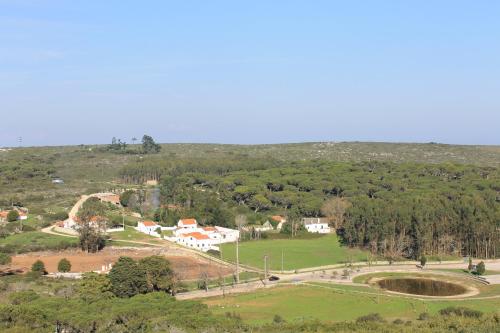 an aerial view of a park with houses on a hill at Pro Touristic Montejunto Villas in Arieiro