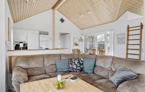 a living room with a couch and a table at Amazing Home In Nordborg With Wifi in Nordborg
