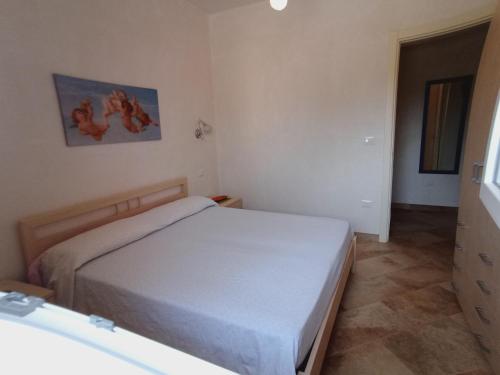Postel nebo postele na pokoji v ubytování Villetta Palicelli