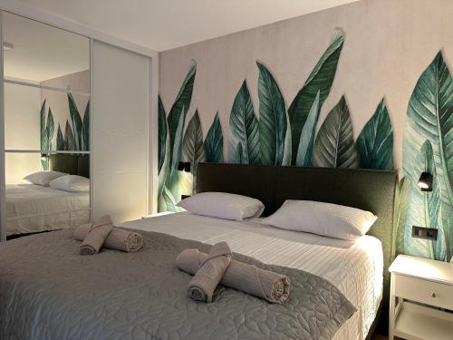 En eller flere senge i et værelse på La Cala Penthouse Retreat