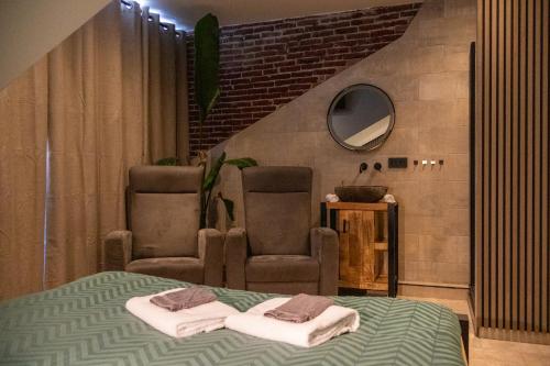 Postel nebo postele na pokoji v ubytování Zeeschelp - Comfortabele kamer bij B&B Gezond aan Zee - Toegang Wellnesstuin meerprijs