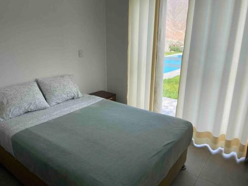 Postel nebo postele na pokoji v ubytování Casa de Campo en Cieneguilla