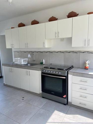 Kuchyň nebo kuchyňský kout v ubytování Casa de Campo en Cieneguilla