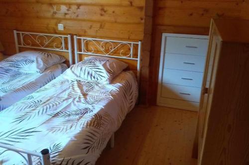 Postel nebo postele na pokoji v ubytování Loue chalet