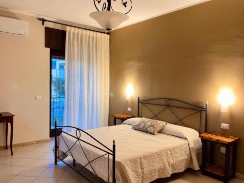 Postel nebo postele na pokoji v ubytování B&B Tempa Rossa