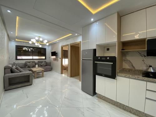 Kuchyň nebo kuchyňský kout v ubytování appartment igar azougagh elhoceima