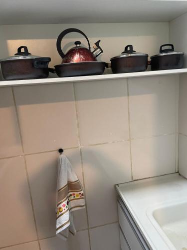 Η κουζίνα ή μικρή κουζίνα στο Loft aconchegante no coração da cidade