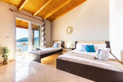 เตียงในห้องที่ Potam'Sea Bliss 36- Beach Front, Sun Beds & Parking