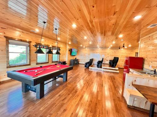 a billiard room with a pool table in it at Luxury 4 BDR, Breathtaking Views, Theater, EVC in Gatlinburg
