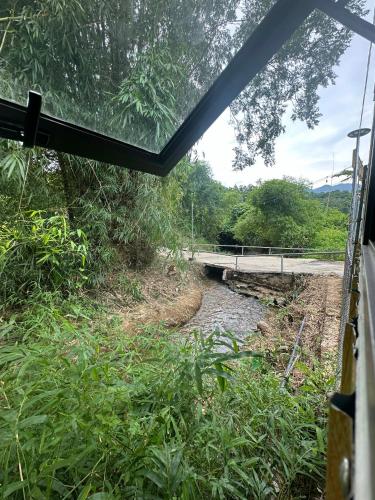 a view of a river from a bus window at Ha Giang Eco Bungalow in Ha Giang