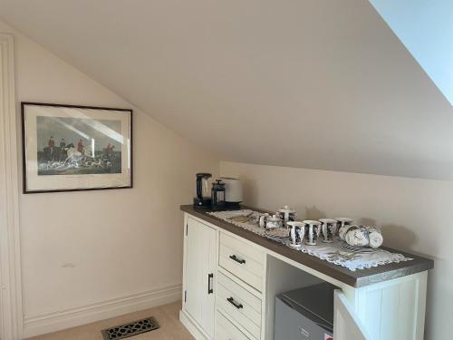 a kitchen with a counter top in a room at The Loft at Henton Lodge in Mauku