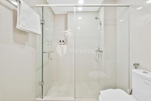 a shower with a glass door in a bathroom at Dahayu by Kozystay - Paskal in Bandung