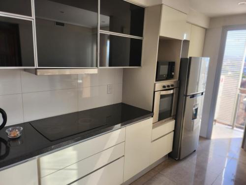 Küche/Küchenzeile in der Unterkunft Apartamento céntrico con las mejores vistas de Mendoza