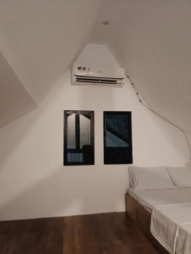 Postel nebo postele na pokoji v ubytování Helmina's Villas