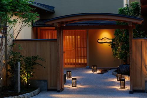an entrance to a building with a group of lights at Shoraiso in Yamanouchi