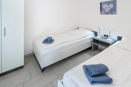 Postel nebo postele na pokoji v ubytování Ferienwohnung Strandläufer