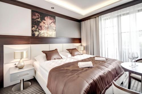 Ліжко або ліжка в номері Boutique Hotel Villa ZAUBER