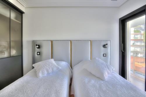 Ένα ή περισσότερα κρεβάτια σε δωμάτιο στο Luxury 4 Stars Apt Croisette