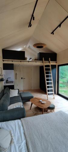 Una cama o camas en una habitación de expérience insolite - La Tiny de Perrine et Julien