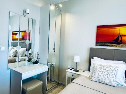 Ένα ή περισσότερα κρεβάτια σε δωμάτιο στο Sun Sight - Deluxe Lounge Suites